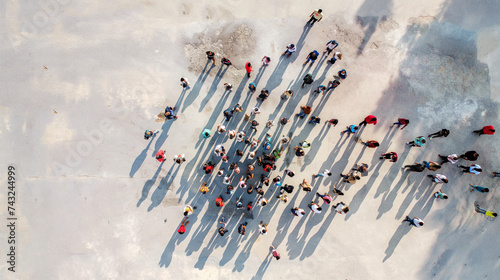 Group of People Standing in the Snow