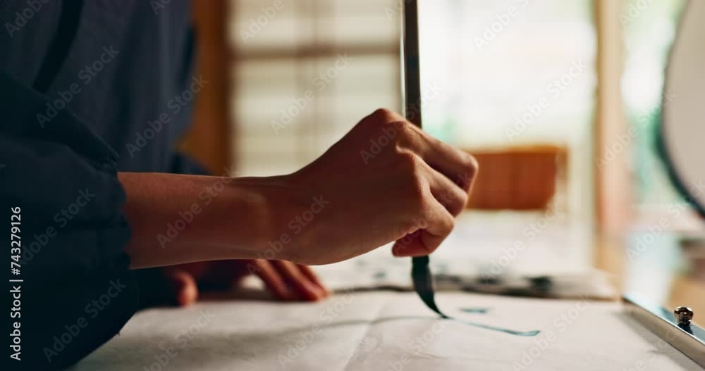 Hands, brush for writing and ancient script for art, calligraphy and closeup with alphabet. Japanese, creativity and vintage tools, paintbrush and stroke with traditional stationery and font