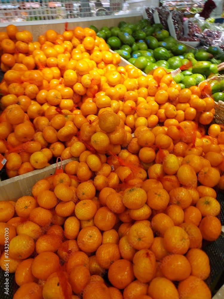 Fresh fruit. Piles of various types of fruit are sold in supermarkets.