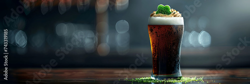   Refreshing glass of frothy beer on rustic wooden table in a cozy pub setting A beer glass with a lot of foamed up foam dark background for St Patrick's day celebration concept    photo