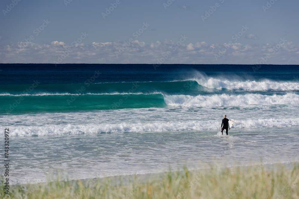 Casuarina Beach Winter Surf: Crisp Offshore Waves under Blue Skies Casuarina Beach Winter Surf: Crisp Offshore Waves under Blue Skies