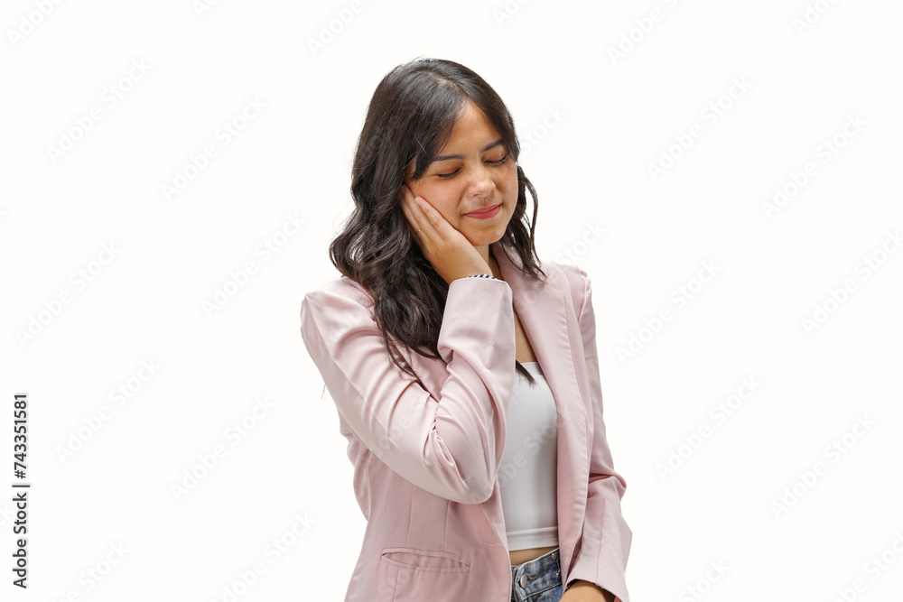 Young Asian girl wearing semi-formal clothes with painful expression because of toothache or dental illness on teeth. Isolated on a white background. Young Asian girl wearing semi-formal clothes with painful expression because of toothache or dental illness on teeth. Isolated on a white background.