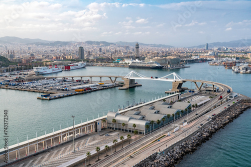 Aerial view of Barcelona city coastline with ships and architecture landmarks 