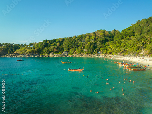 aerial view scenery perfect beach. .Freedom Beach has large trees and a mature forest. .Tourists prefer to come by long-tail boat. .The footpath is far from the beach and is steep. white sand beach