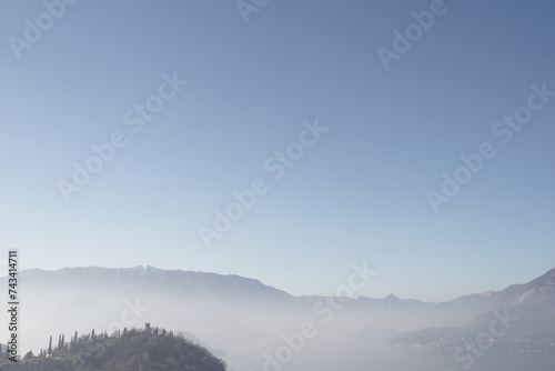 View of a glimpse of Lake Como from Tondello area, hamlet of Perledo, Italy photo