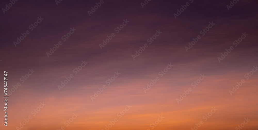 Enjoy a panoramic view of the skyline. The sun rises in the morning sky with colorful clouds. and beautiful cloud patterns In the soft light of the morning	