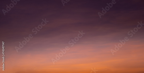 Enjoy a panoramic view of the skyline. The sun rises in the morning sky with colorful clouds. and beautiful cloud patterns In the soft light of the morning 