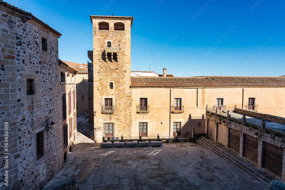 Plaza with very old buildings and towers of manor houses in the city of Caceres.