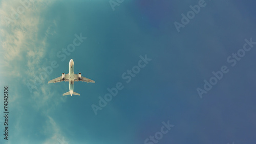 Airplane flight in blue sky, business and travel concept