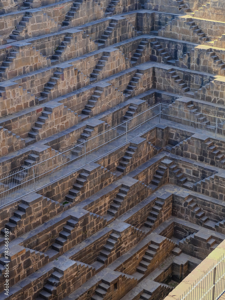 The amazing Chan Baori Step well and Panna Meena Ka Kund stair case to a pond, swimming pool, in Jaipur, Rajasthan, India The amazing Chan Baori Step well and Panna Meena Ka Kund stair case to a pond, swimming pool, in Jaipur, Rajasthan, India