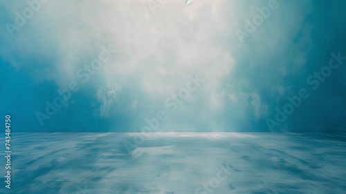 An ethereal blue textured backdrop with soft light diffusion  ideal for graphic design or creative backgrounds. 