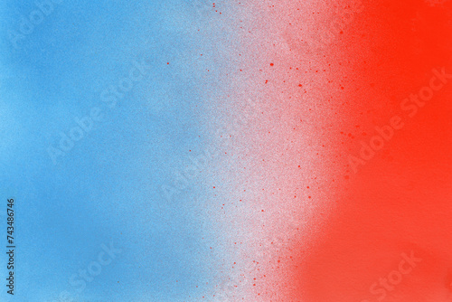 red and blue spray paint on a white color paper background