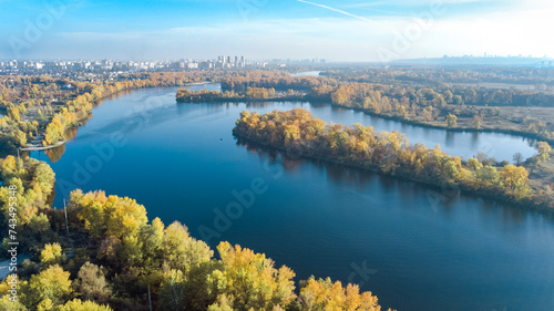 Kyiv city skyline and Dnipro river aerial drone view from above, Kiev Dnieper and Desenka river islands in autumn, Ukraine
