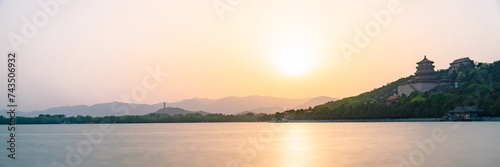 sunset over the lake in summer palace photo