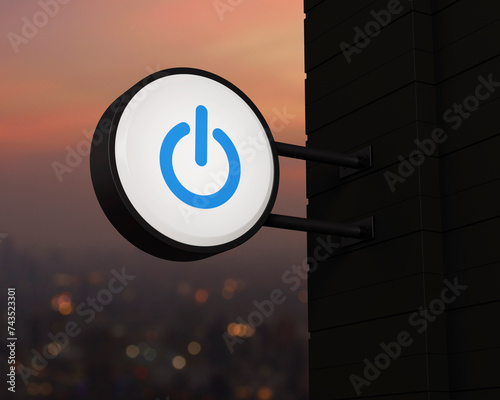 Power button icon on hanging black rounded signboard over blur of cityscape on warm light sundown, Start up business concept, 3D rendering