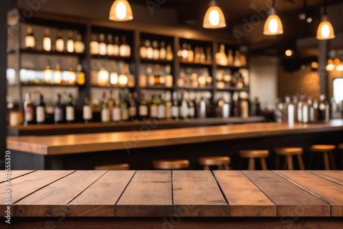 Defocused background and bottles of restaurant bar or cafeteria background wooden table top for pro
