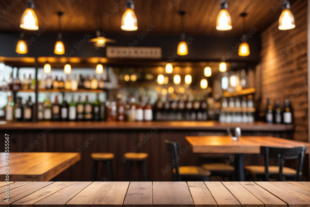 Defocused background and bottles of restaurant bar or cafeteria background wooden table top for pro Defocused background and bottles of restaurant bar or cafeteria background wooden table top for pro