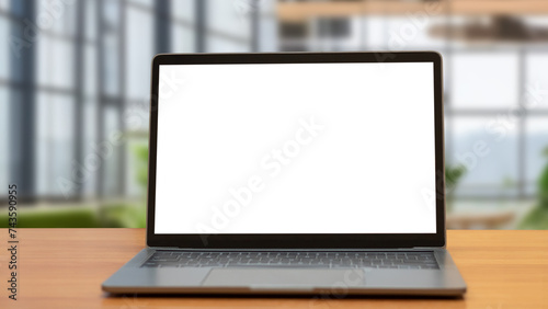 Fototapeta Naklejka Na Ścianę i Meble -  Laptop computer on desk at office or co-working space, Laptop with white blank on screen and blurred background , working space concept.