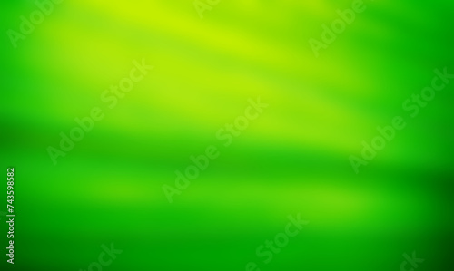 Green abstract background. Digital image of light rays, stripes lines with green light