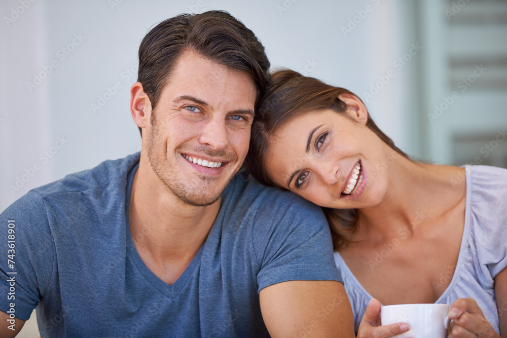Happy couple, portrait and coffee with love for morning, bonding or weekend together at home. Face of young man and woman with smile, cup of tea or cappuccino for support, care or trust at apartment Happy couple, portrait and coffee with love for morning, bonding or weekend together at home. Face of young man and woman with smile, cup of tea or cappuccino for support, care or trust at apartment