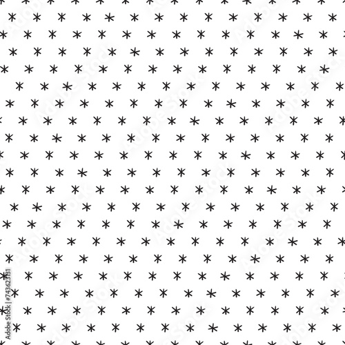 Stylish monochrome doodles. Hand drawn snowflakes. Black and white seamless pattern