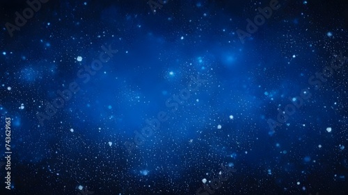 Dark blue and glow particle abstract background © QasimAli