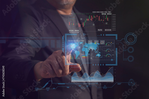 Businessman in suit working with digital vurtual screen, Showing a growing virtual hologram stock, invest in trading. business finance technology and investment concept. photo