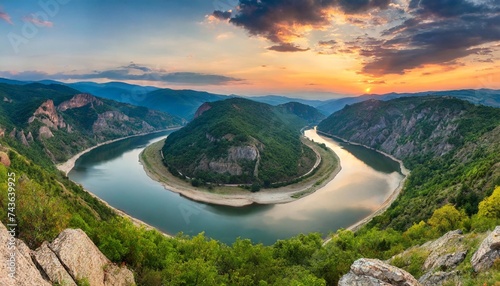 panoramic sunset view with one of most picturesque meander of arda river near kardzhali rodopi mountains in bulgaria photo