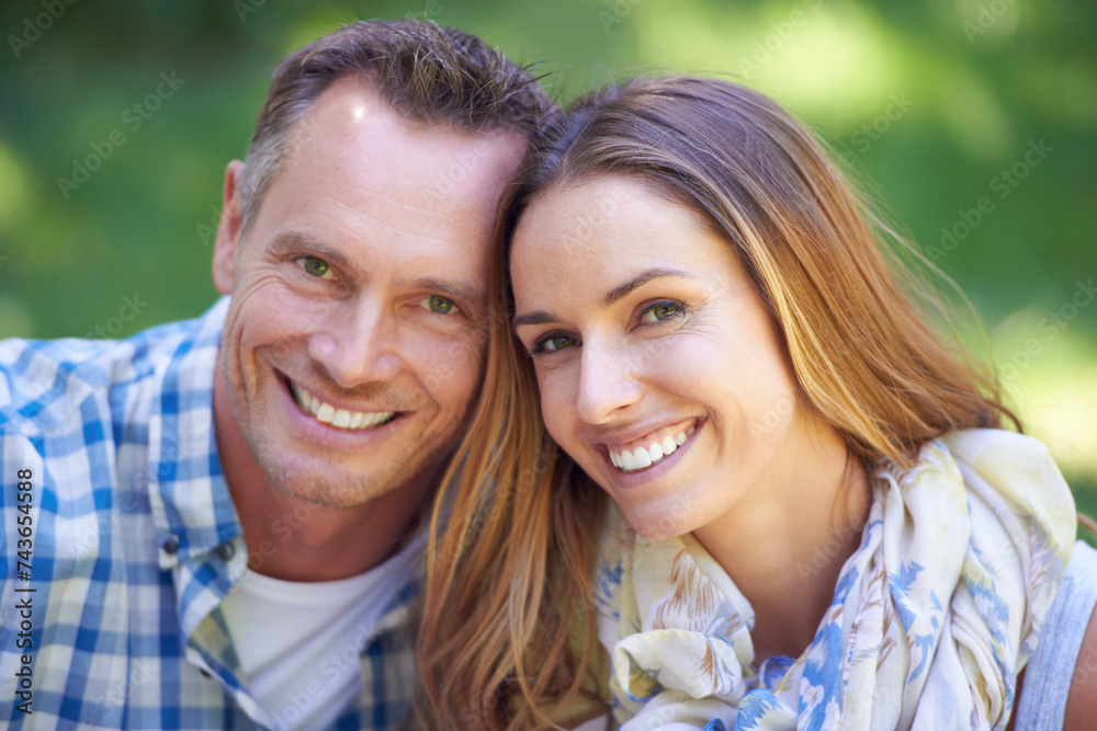 Portrait, bonding and couple with smile in park for summer romance, trees and fun outdoor date. Love, mature man and happy woman together in garden with morning sunshine, hug and marriage in nature. Portrait, bonding and couple with smile in park for summer romance, trees and fun outdoor date. Love, mature man and happy woman together in garden with morning sunshine, hug and marriage in nature.