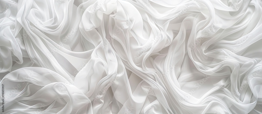 This close-up view showcases the texture and details of a white fabric, perfect for various applications such as textiles, clothing, household items, wallpaper, tableware, and decor.