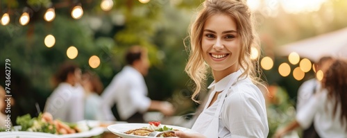 Waitress female catering a fresh delicious food and serving on wedding