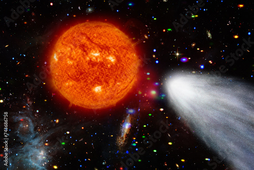 Comet flying through space. The elements of this image furnished by NASA.