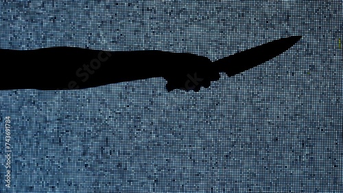 фотографія Silhouette against digital television screen