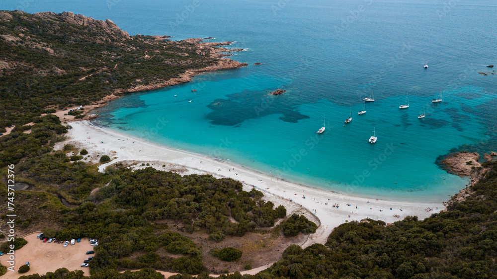 Obraz premium Aerial photo by drone of the roccapina beach in Sartène, the turquoise sea and the sleeping lion rock in Corsica