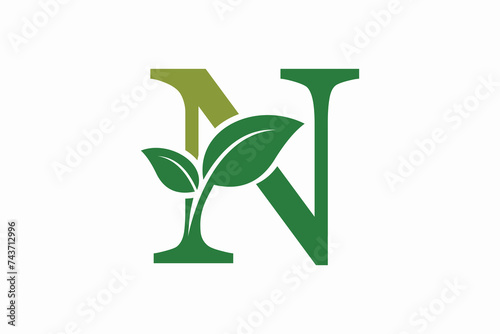 tree leaf logo design with letter logo n consept premium vector