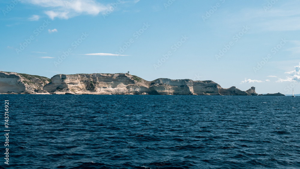Summer in the Lavezzi Islands by the Mediterranean sea between turquoise water and fine sand beach, in Bonifacio in Corsica Summer in the Lavezzi Islands by the Mediterranean sea between turquoise water and fine sand beach, in Bonifacio in Corsica