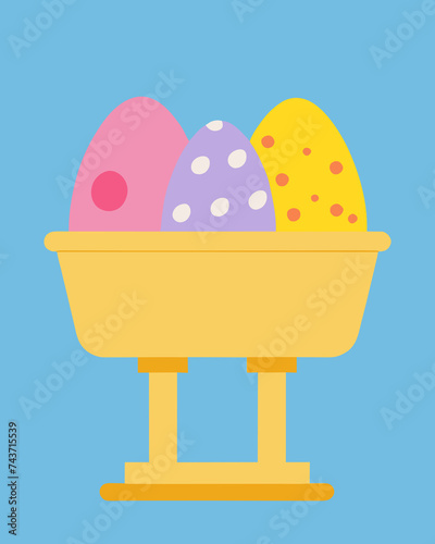 Colorful Easter eggs in a yellow basket, blue background. (ID: 743715539)