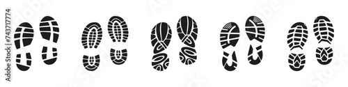 Boots footprints human shoes icon collection. Set of black prints of shoes. Black imprint soles shoes icon collection. Set of footprints stamped icons photo