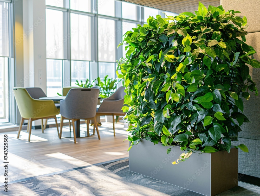 Workspace with a green plant integrating nature into the office enhancing mood and creativity among employees