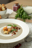Cream soup of vegetables and champignons with croutons
