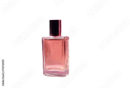 Bottle of perfume and flower arrangement of rosebuds on pink background