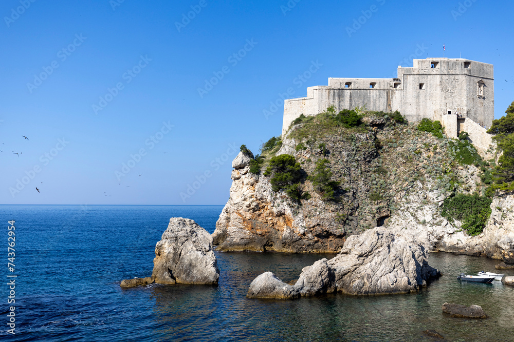 Dubrovnik, Croatia - June 27, 2023: Fort Lovrijenac, medieval defensive structure built on a rock above the Adriatic Sea