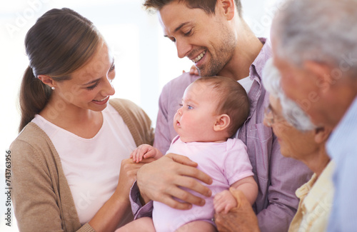 Family, grandparents and parents with baby for happiness at home, people bonding with love and relationship. Support, trust and smile for pride with generations, childhood and connect with infant