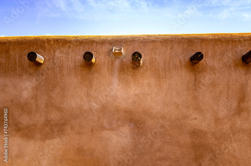 Adobe Wall on Sunlit Day