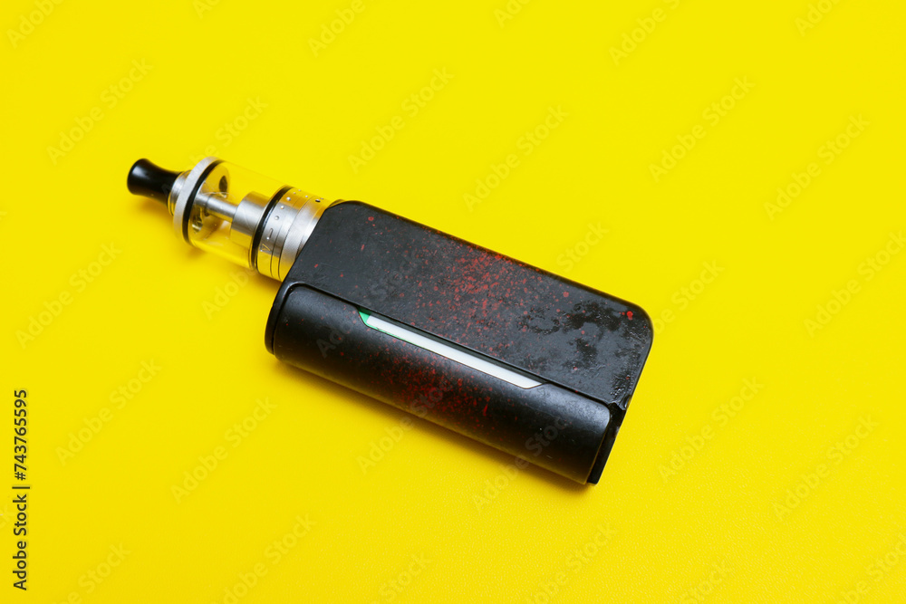 vaporizer vape isolated on yellow background vaporizer vape isolated on yellow background