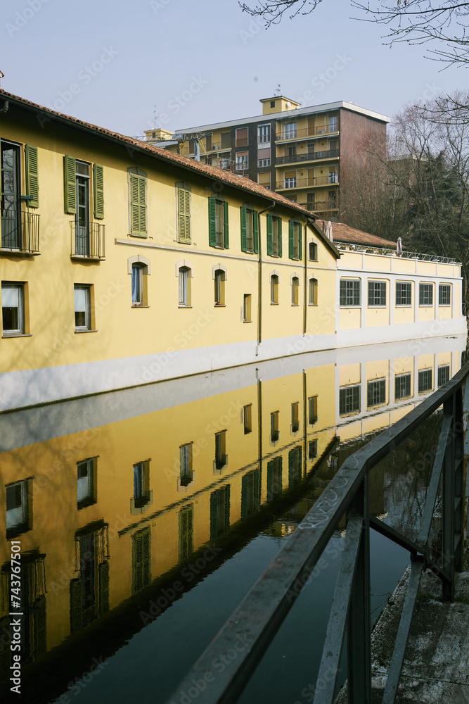 Picturesque scene of Milan's Naviglio Martesana, a peaceful haven amidst the bustling city.