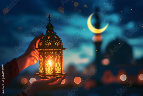 Ramadan concept - Ornamental Arabic lantern with mosque and ramadan moon in background