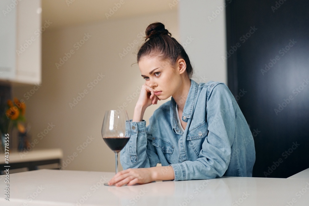 Lonely, Depressed Woman Drinking Wine Alone at Home Lonely, Depressed Woman Drinking Wine Alone at Home