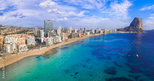Costa Blanca, Spain. Aerial drone panoramic view of coastal city Calpe with great beaches. Alicante province. photo