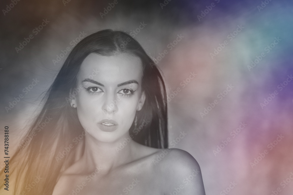 Portrait shot of a pretty young woman in RGB colors. Surreal blurry portrait